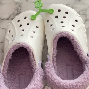 White crocs with lavender fuzzy cozy lining